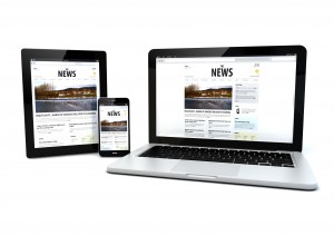 render of laptop, tablet pc and smartphone with a news page on the screen